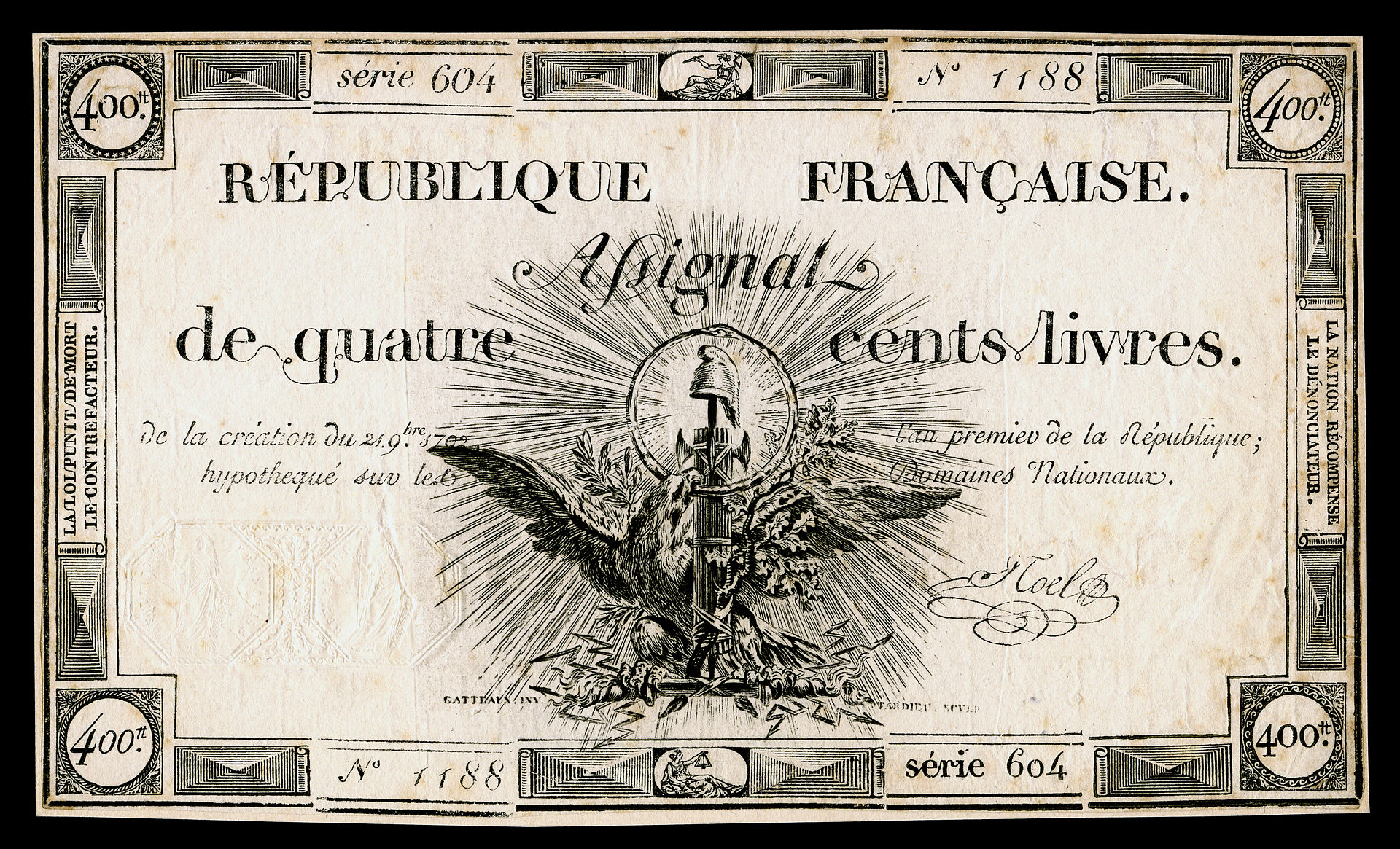 A printed revolutionary banknote, an assignat, with an ornate border and a face value of 400 livres.